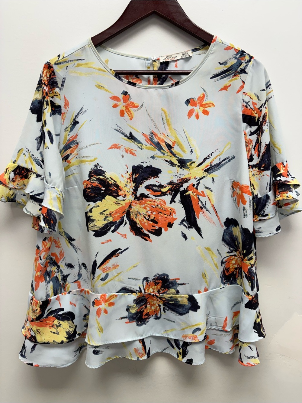 Dex Light Blue Floral Ruffle Sleeve Top with Orange and Yellow Accents